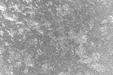 Çizik ve çatlaklarla bembeyaz bir doku.