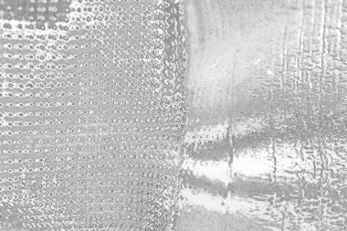 Çizik ve çatlaklarla bembeyaz bir doku.