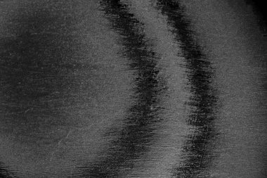 Çizik ve çatlaklarla dolu pis bir doku.