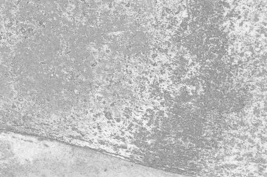 Çizik ve çatlaklarla dolu pis bir doku.