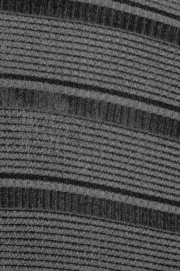 Çizik ve çatlaklarla dolu pis bir doku.