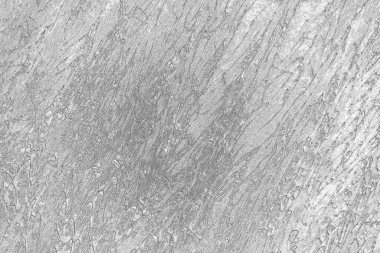 Çizik ve çatlaklarla bembeyaz bir doku.