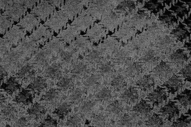 Çizik ve çatlaklarla dolu pis bir doku.