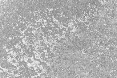 Çizik ve çatlaklarla dolu pis bir doku.