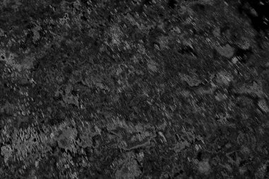 Çizik ve çatlaklarla dolu pis bir doku.