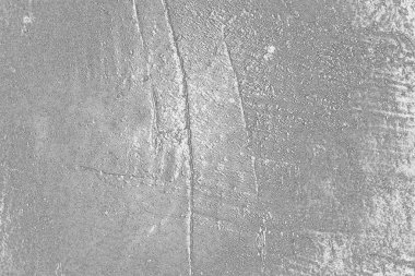 Çizik ve çatlaklarla bembeyaz bir doku.