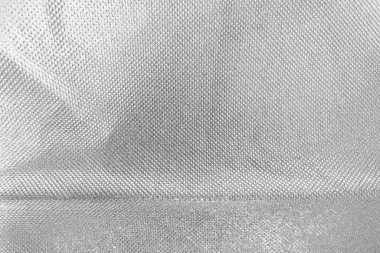 Çizik ve çatlaklarla bembeyaz bir doku.