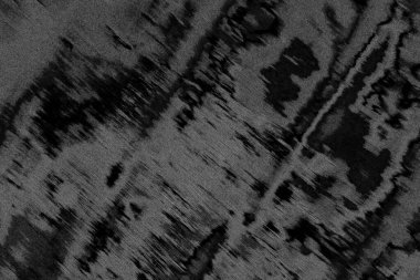 Çizik ve çatlaklarla dolu pis bir doku.