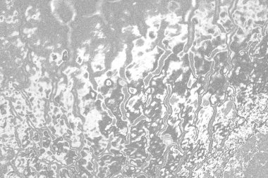 Çizik ve çatlaklarla bembeyaz bir doku.