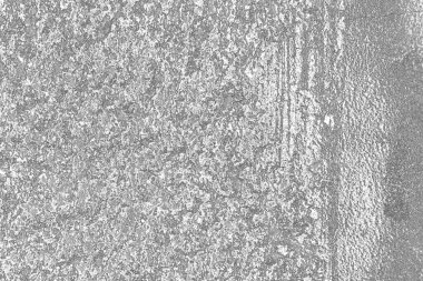 Çizik ve çatlaklarla dolu pis bir doku.