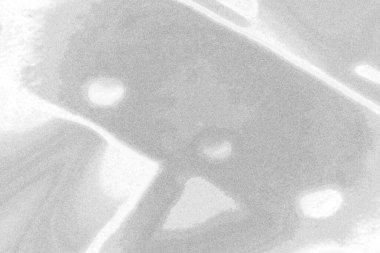 Çizik ve çatlaklarla bembeyaz bir doku.