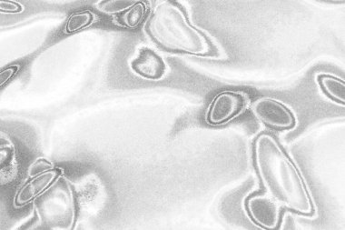 Çizik ve çatlaklarla bembeyaz bir doku.