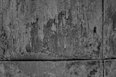 Çizik ve çatlaklarla dolu pis bir doku.