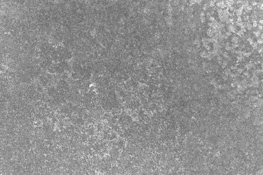 Çizik ve çatlaklarla bembeyaz bir doku.