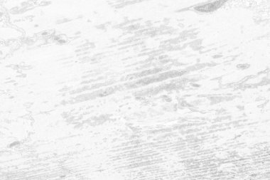 Çizik ve çatlaklarla bembeyaz bir doku.