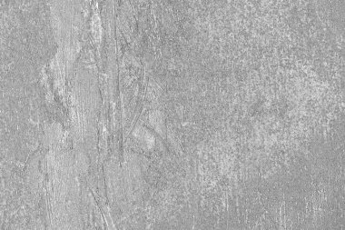 Çizik ve çatlaklarla bembeyaz bir doku.