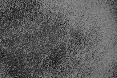 Çizik ve çatlaklarla dolu pis bir doku.