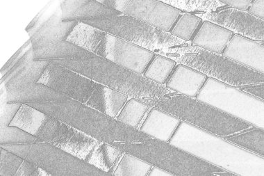 Çizik ve çatlaklarla dolu pis bir doku.