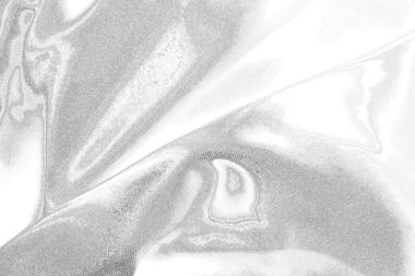 Çizik ve çatlaklarla bembeyaz bir doku.