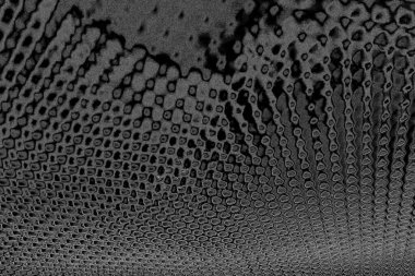 Çizik ve çatlaklarla dolu pis bir doku.