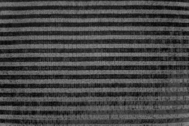 Çizik ve çatlaklarla dolu pis bir doku.