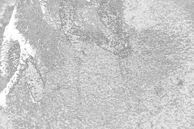 Çizik ve çatlaklarla dolu pis bir doku.