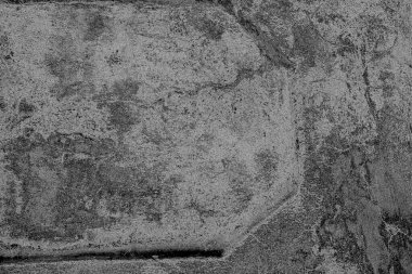 Çizik ve çatlaklarla dolu pis bir doku.