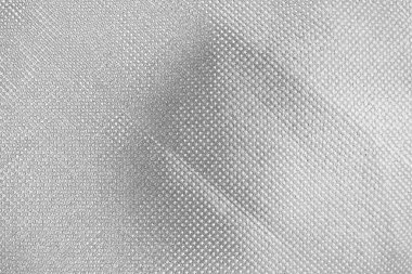 Çizik ve çatlaklarla bembeyaz bir doku.