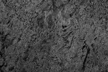 Çizik ve çatlaklarla dolu pis bir doku.