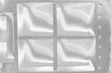 Çizik ve çatlaklarla bembeyaz bir doku.