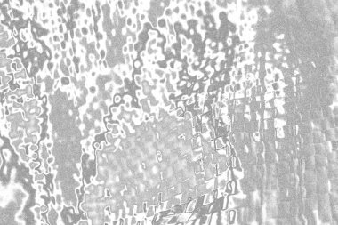 Çizik ve çatlaklarla bembeyaz bir doku.