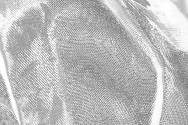 Çizik ve çatlaklarla dolu pis bir doku.