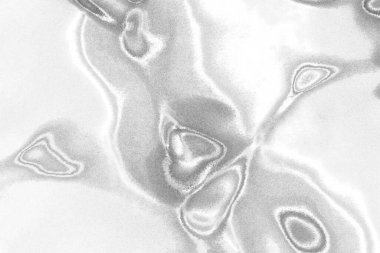 Çizik ve çatlaklarla bembeyaz bir doku.