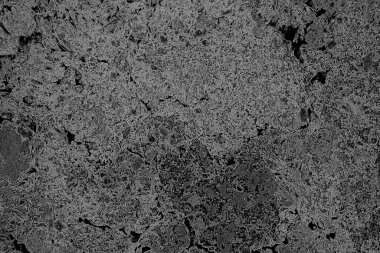 Çizik ve çatlaklarla dolu pis bir doku.