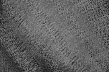 Çizik ve çatlaklarla dolu pis bir doku.