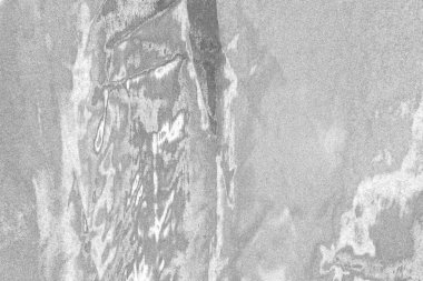 Çizik ve çatlaklarla bembeyaz bir doku.