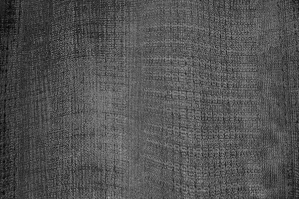 Çizik ve çatlaklarla dolu pis bir doku.