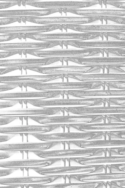 Çizik ve çatlaklarla bembeyaz bir doku.