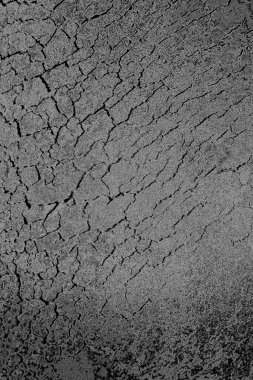 Çizik ve çatlaklarla dolu pis bir doku.