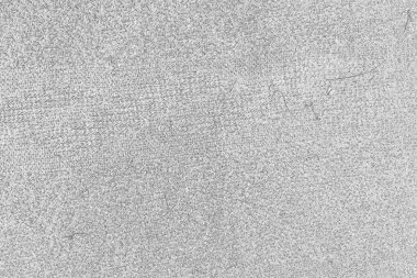 Çizik ve çatlaklarla dolu pis bir doku.