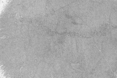 Çizik ve çatlaklarla dolu pis bir doku.