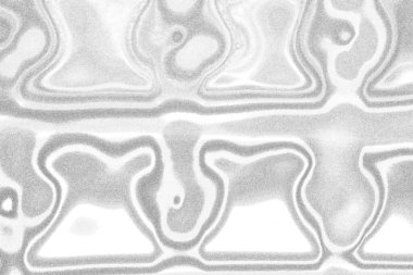 Çizik ve çatlaklarla bembeyaz bir doku.