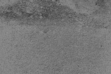 Çizik ve çatlaklarla dolu pis bir doku.