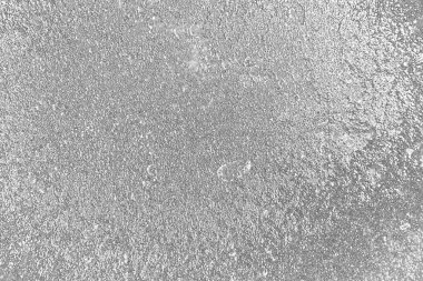 Çizik ve çatlaklarla bembeyaz bir doku.