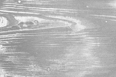 Çizik ve çatlaklarla bembeyaz bir doku.