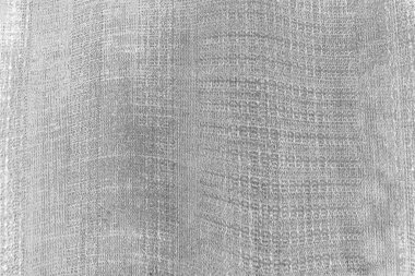 Çizik ve çatlaklarla bembeyaz bir doku.