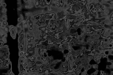 Çizik ve çatlaklarla dolu pis bir doku.