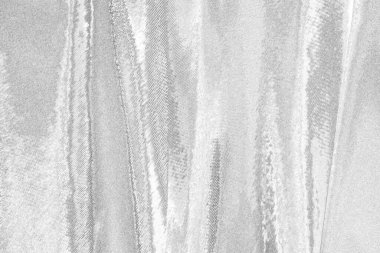 Çizik ve çatlaklarla bembeyaz bir doku.