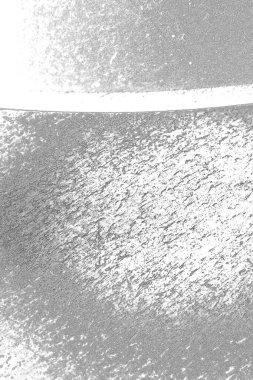 Çizik ve çatlaklarla bembeyaz bir doku.