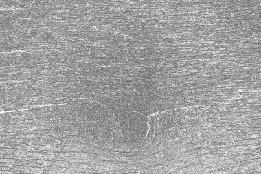 Çizik ve çatlaklarla dolu pis bir doku.